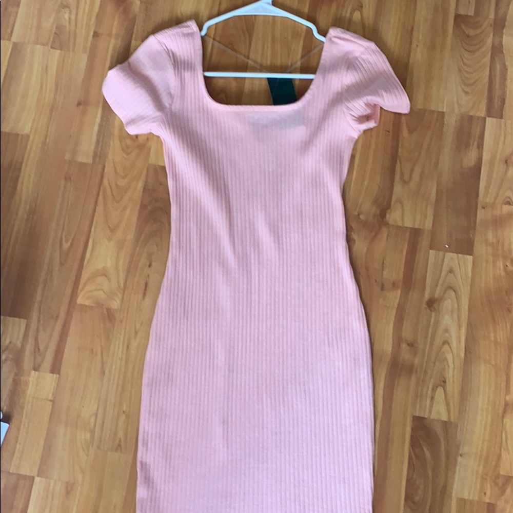 A light pink dress with a cool neckline